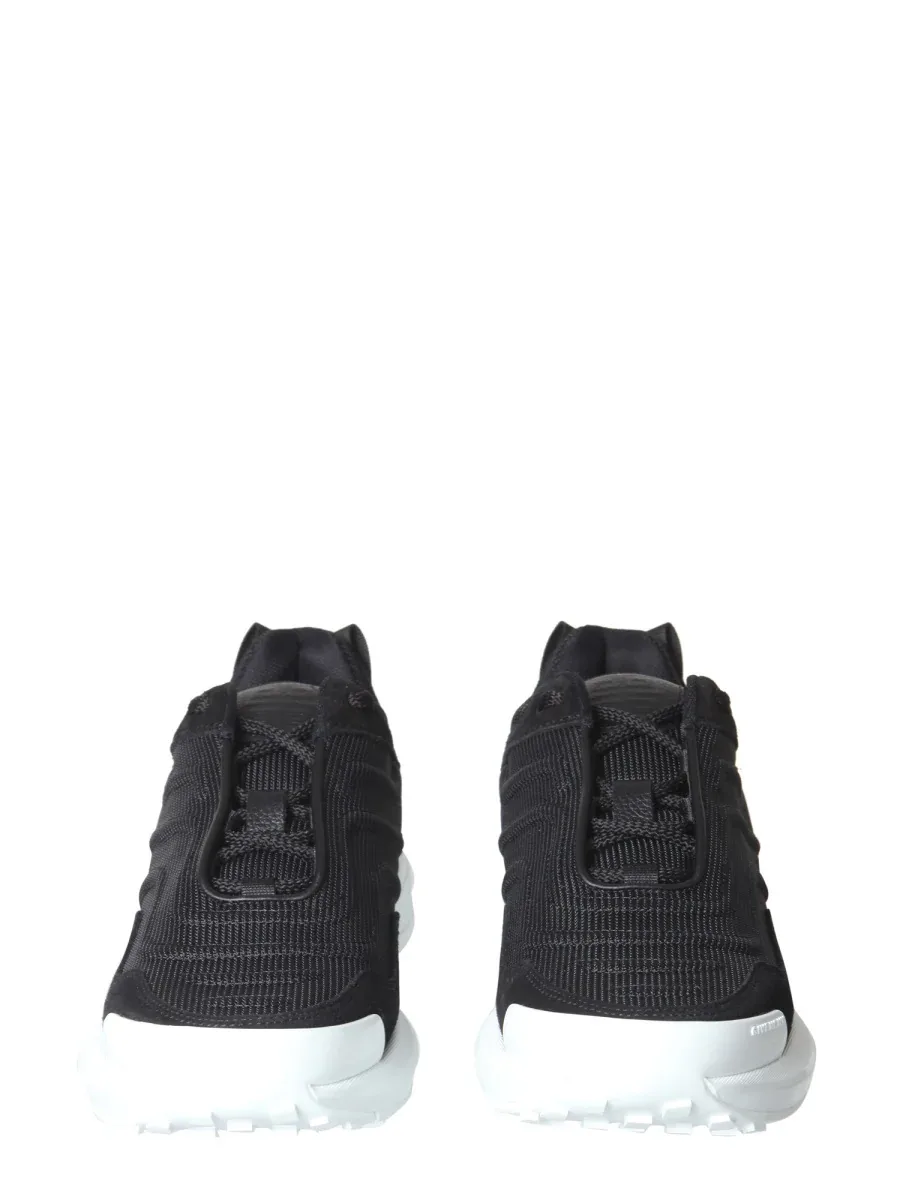Embossed Rubber Sole Sneakers by Givenchy