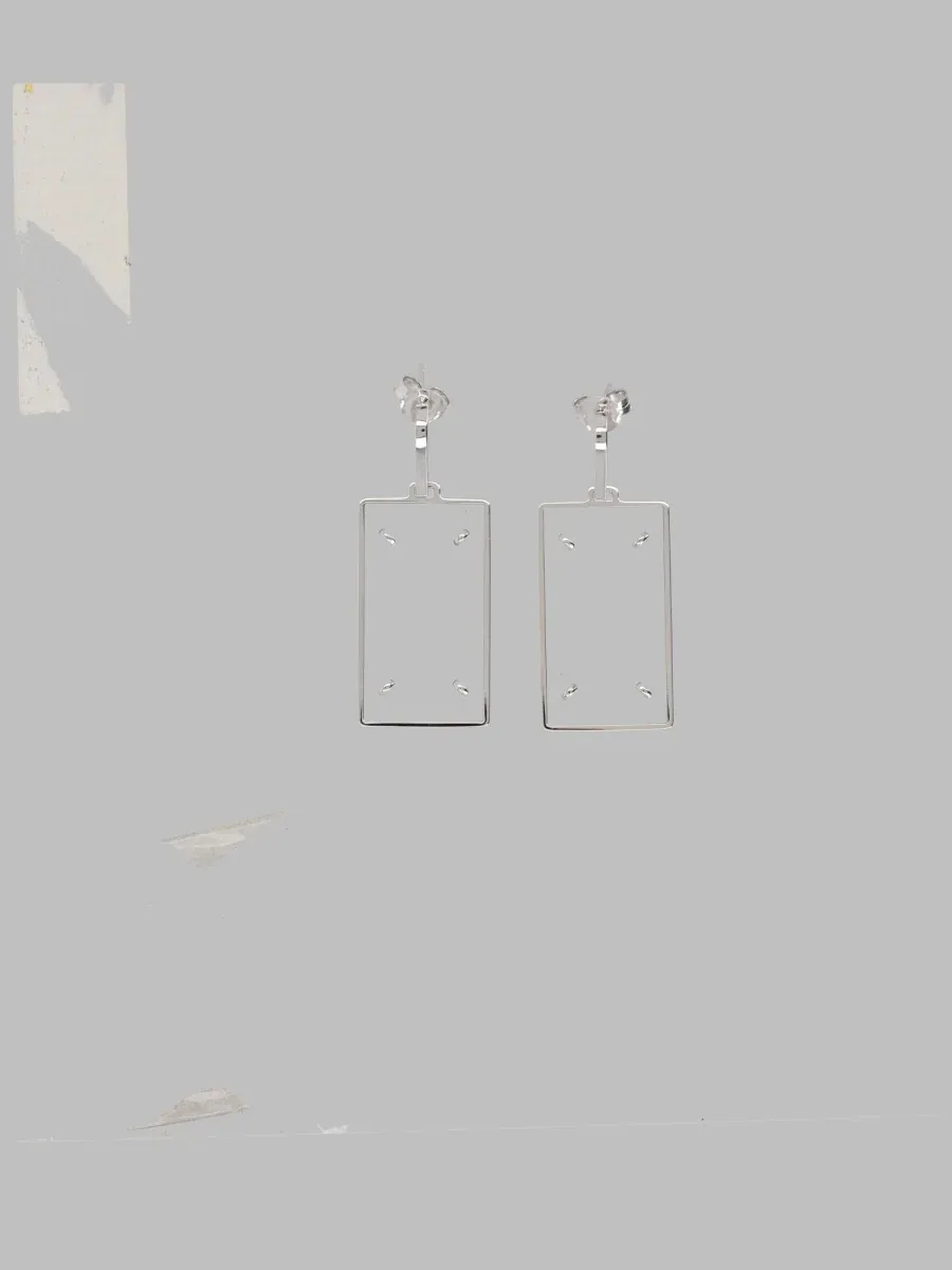 Earrings by Maison Margiela
