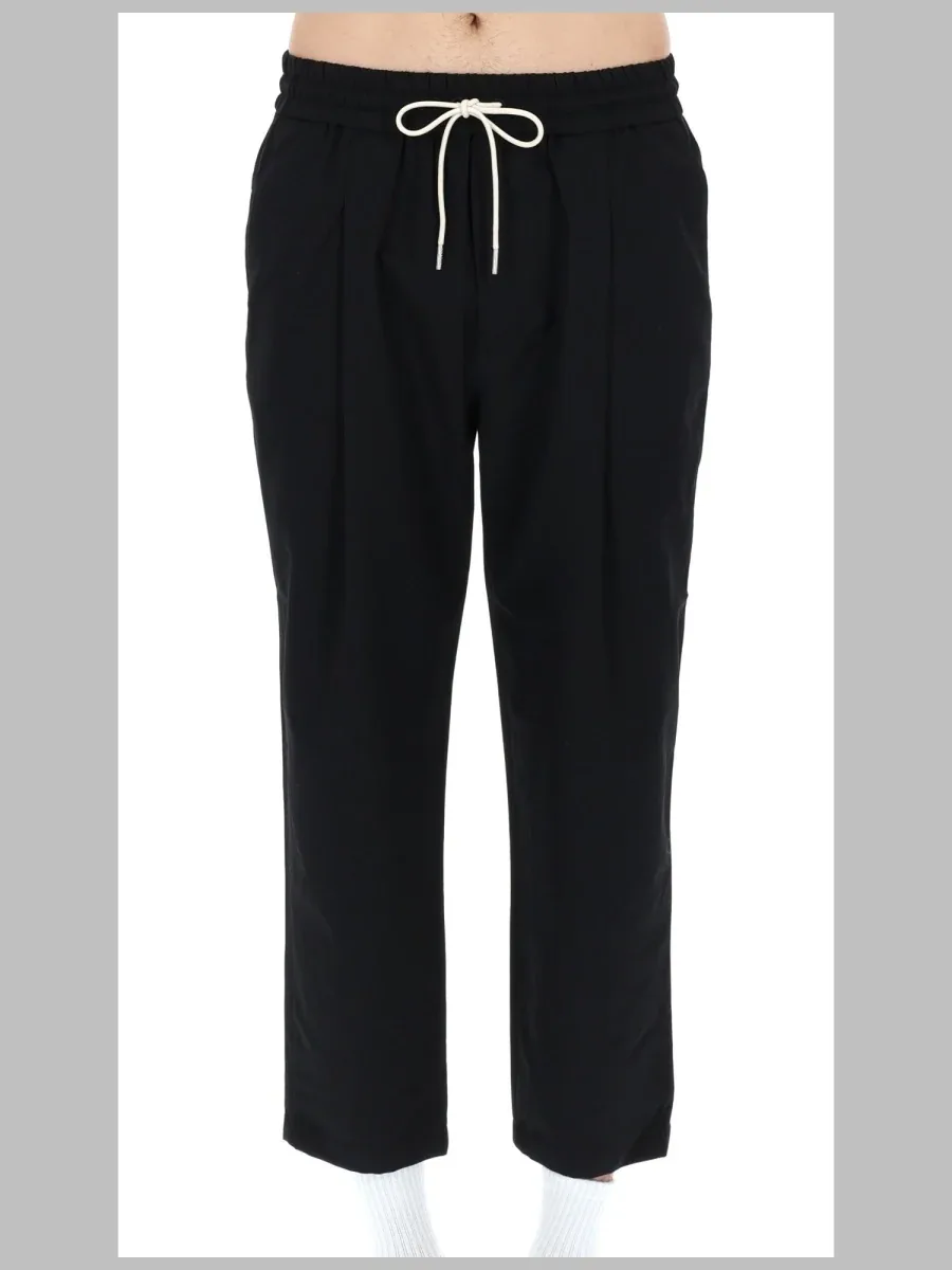 Virgin Wool Blend Cropped Trousers by DrôLe De Monsieur