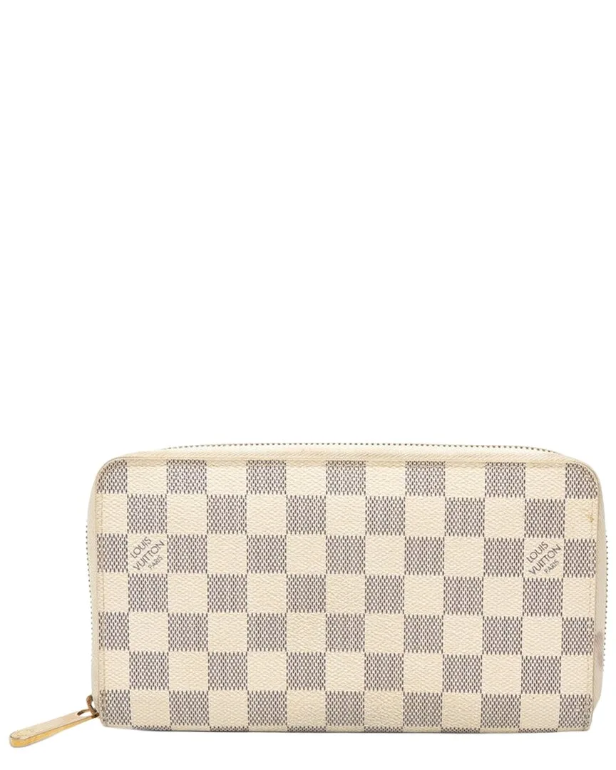 White Coated/Waterproof Canvas Zippy Organizer Long Wallet (authentic Pre-Loved) by Louis Vuitton