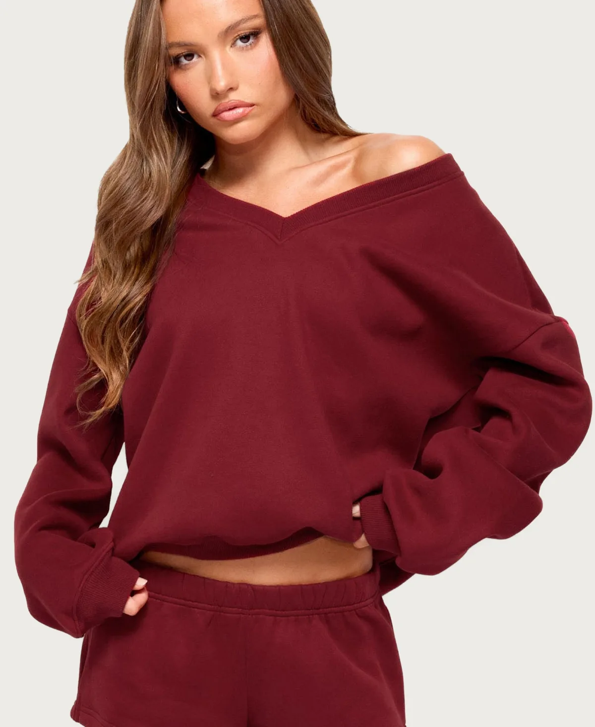 Bronte V Neck Sweatshirt by Edikted