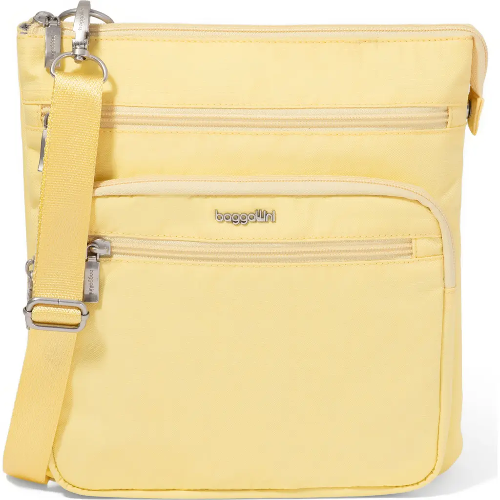Out And About Crossbody Bag in Butter Yellow at Nordstrom by BAGGALLINI
