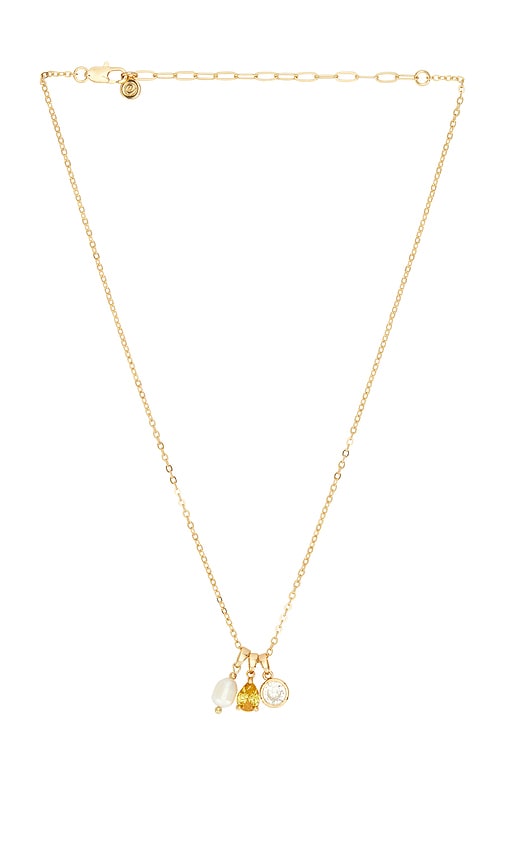 Dainty Triple Charm Necklace in Metallic Gold.