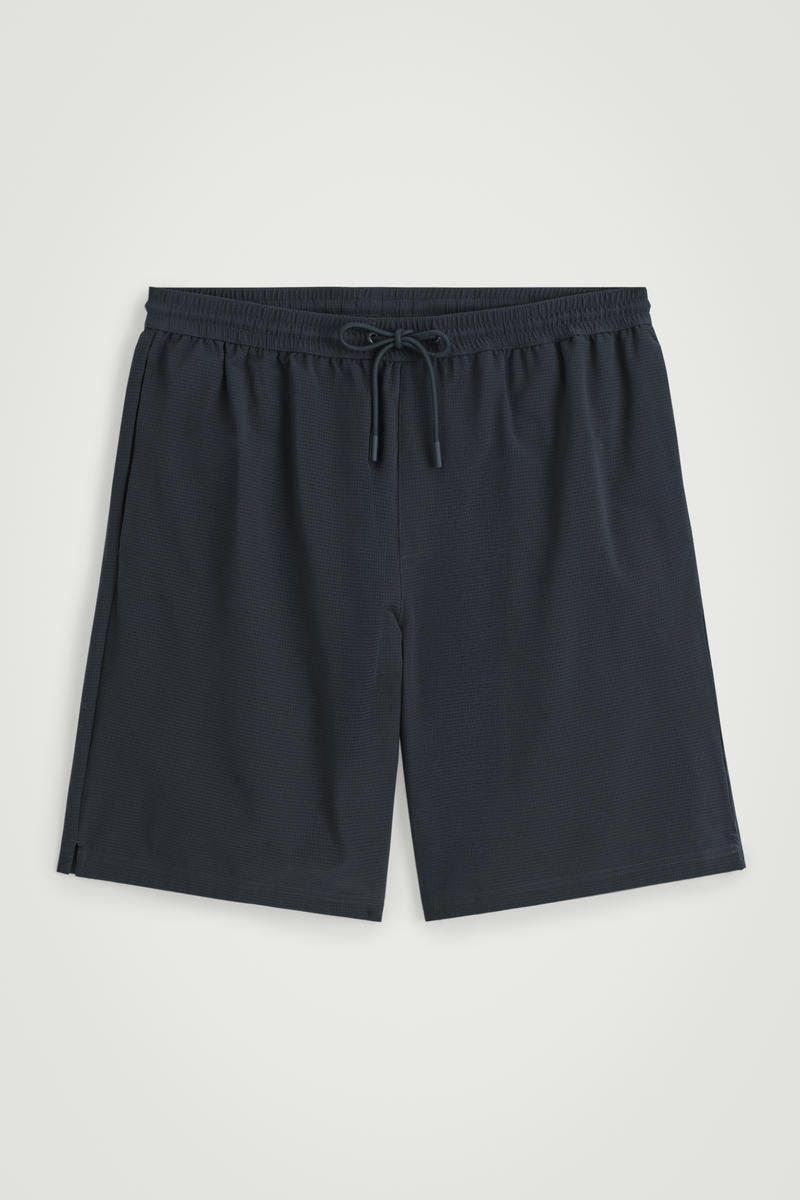 Perforated Swim Board Shorts by COS