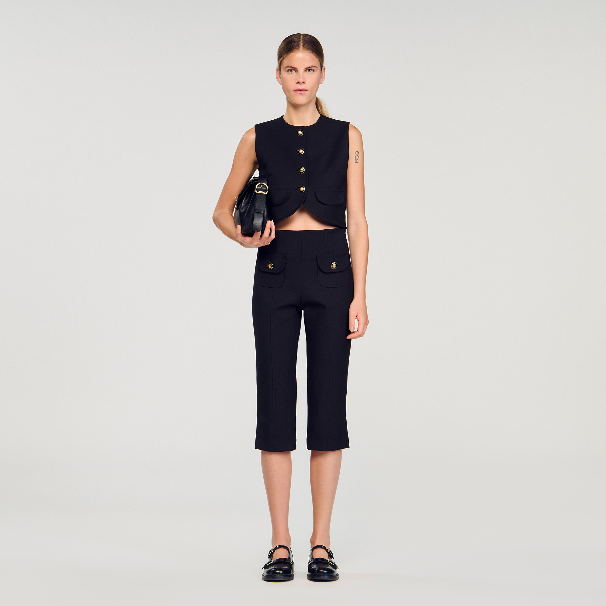 Decorative buttoned crop top