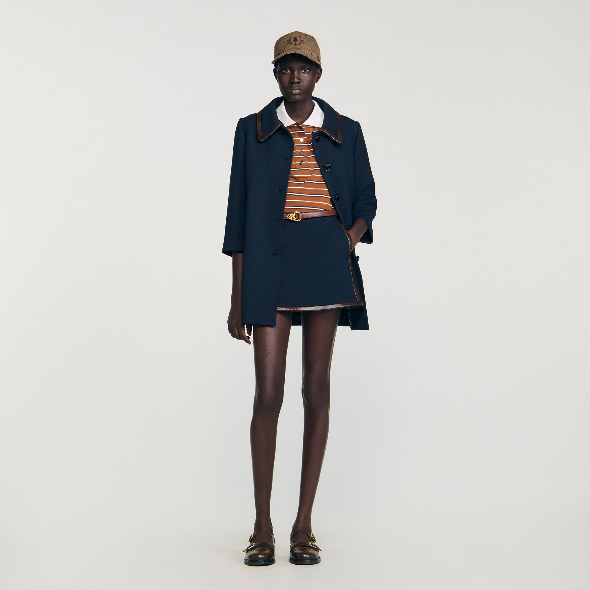 Mini skirt with leather bands by Sandro