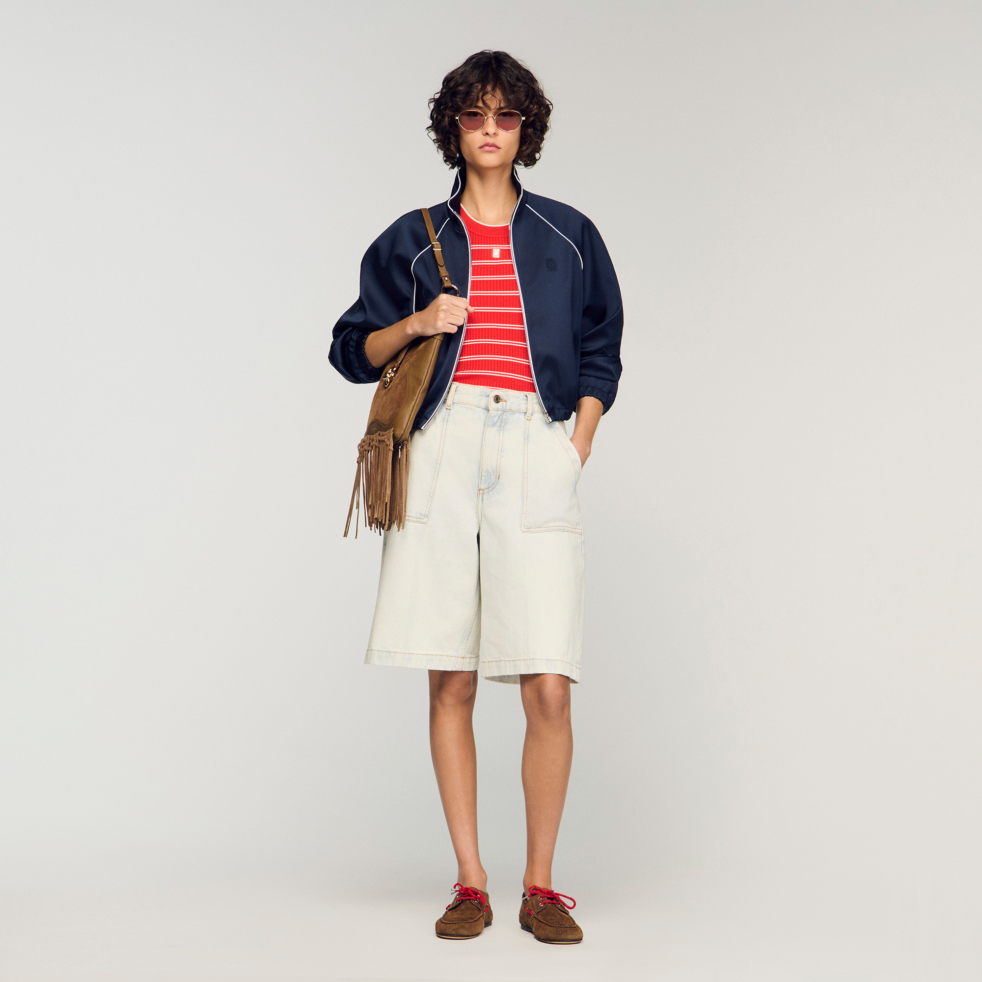 Washed denim Bermuda shorts by Sandro