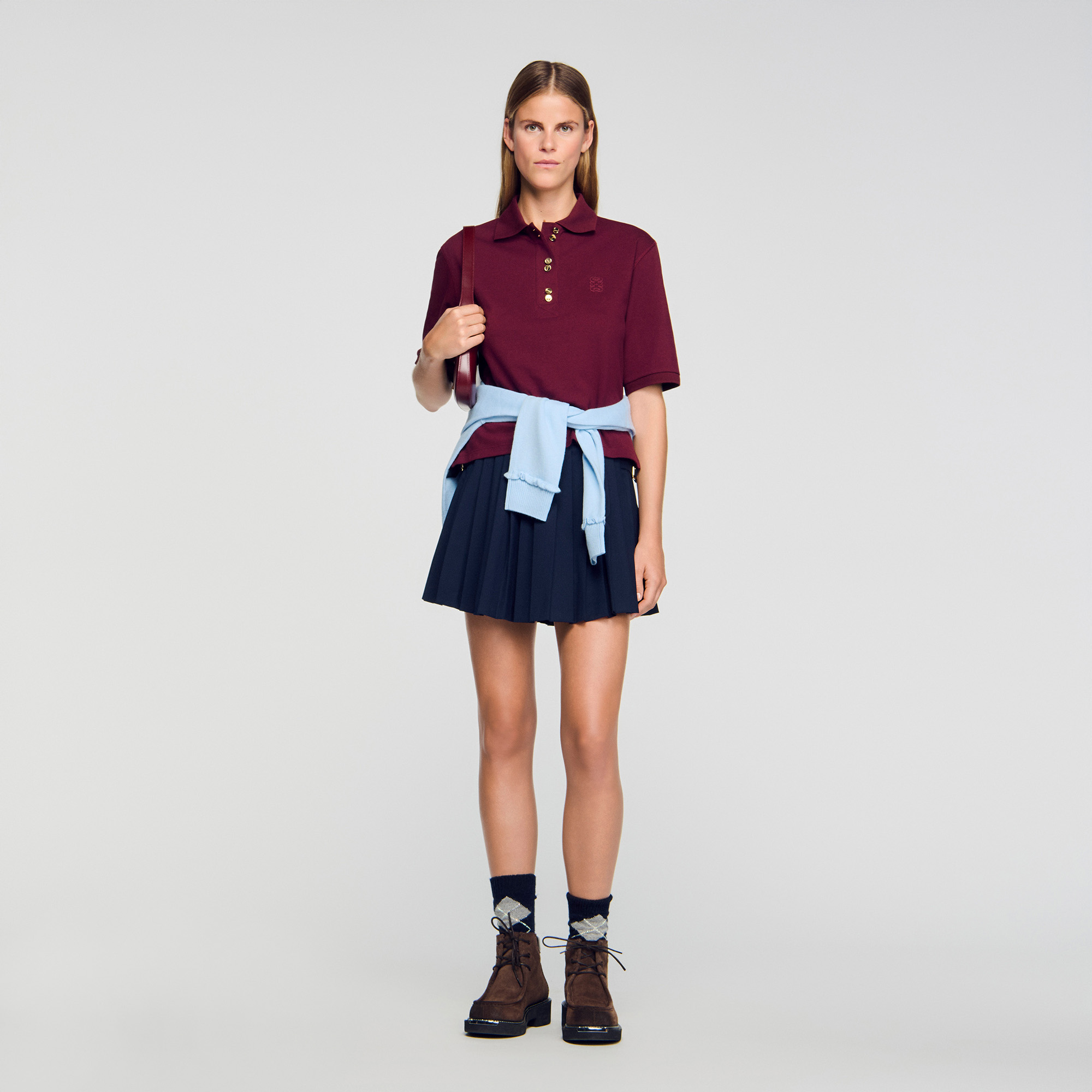 Polo shirt with decorative buttons by Sandro