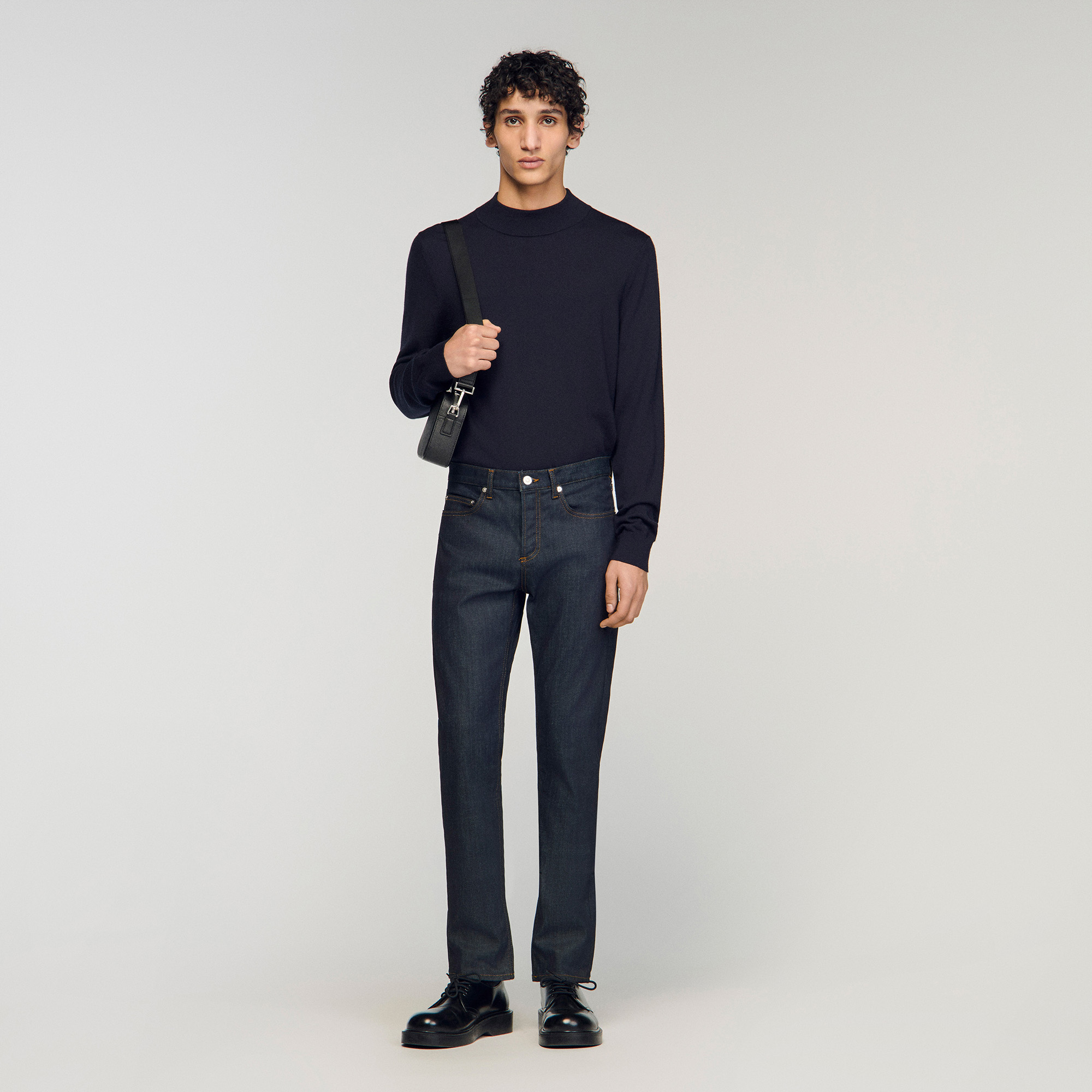 Slim fit raw jeans by Sandro
