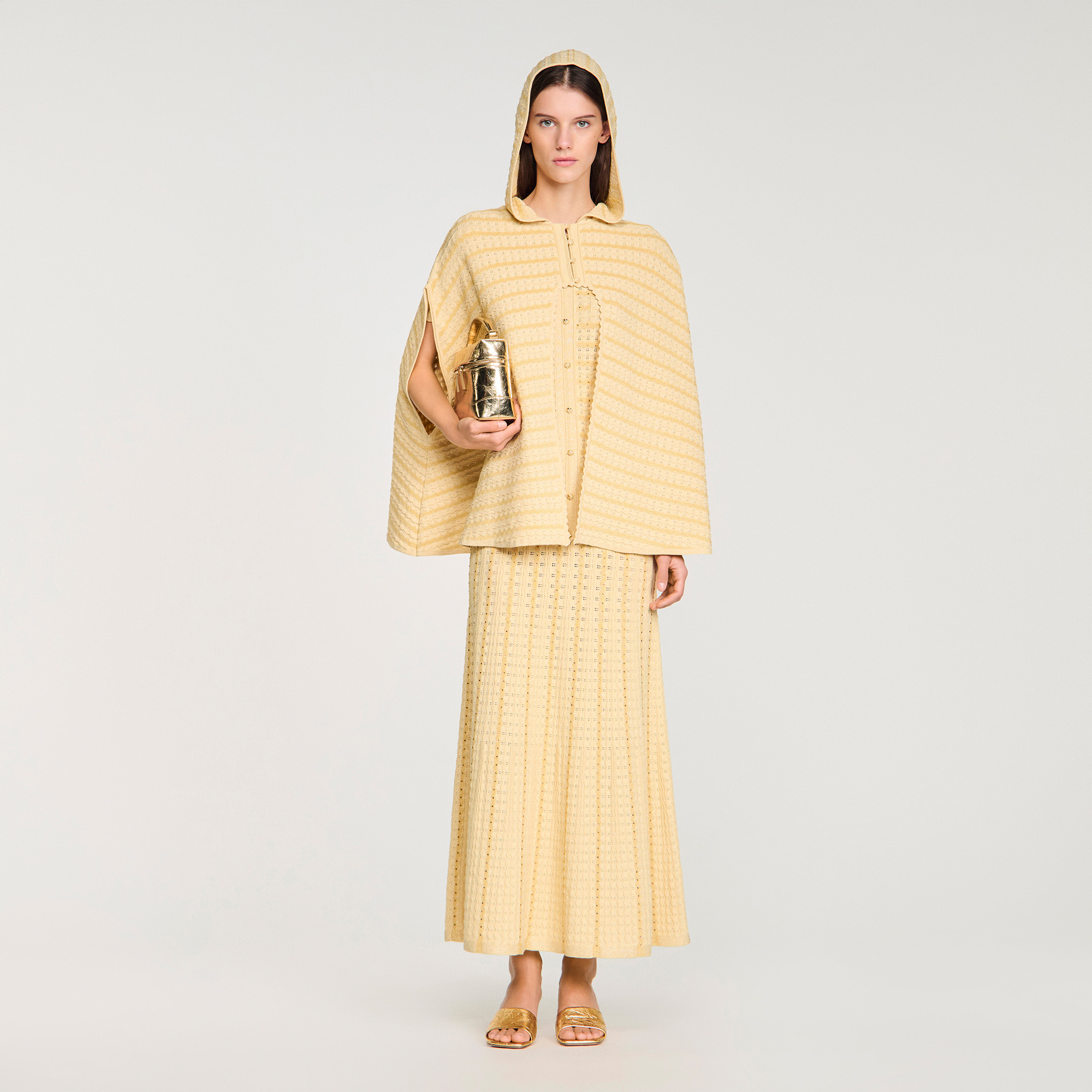 Rhinestone knit cape by Sandro