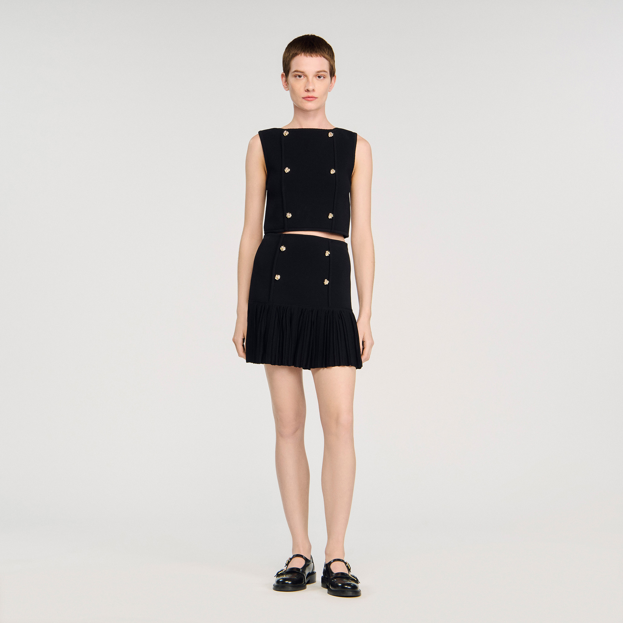 Mini pleated fine knit skirt