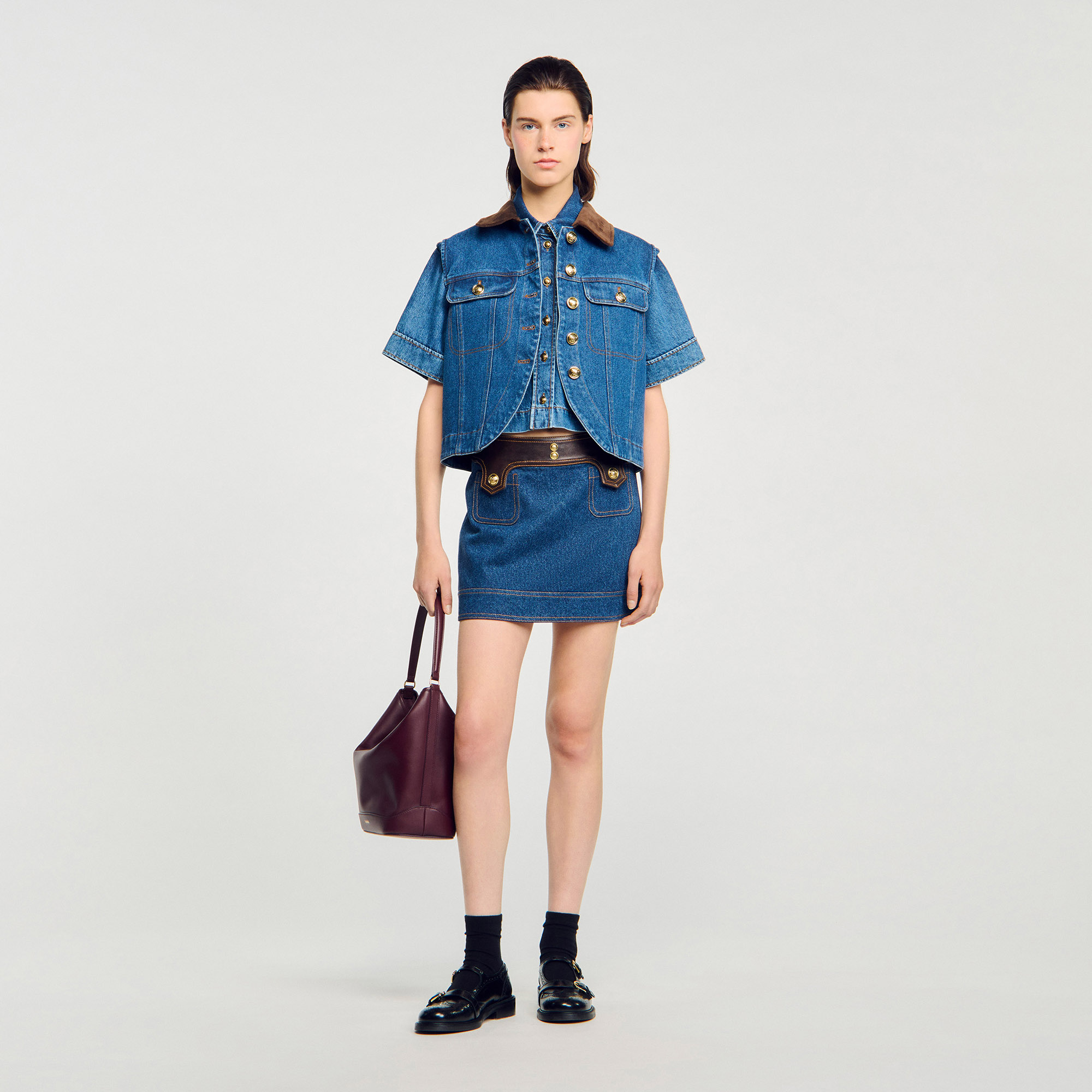 Mini denim and leather skirt