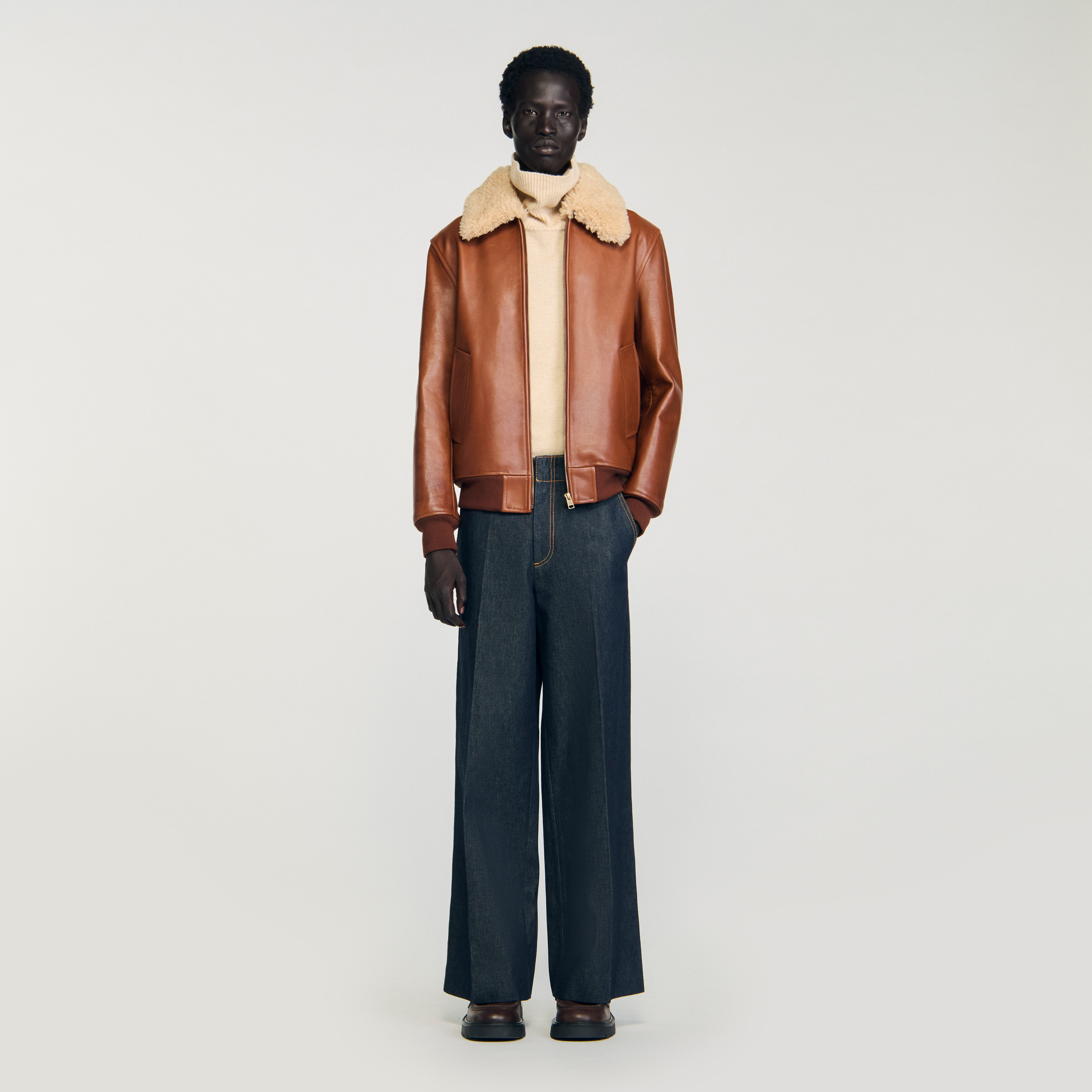 Leather jacket with shearling collar