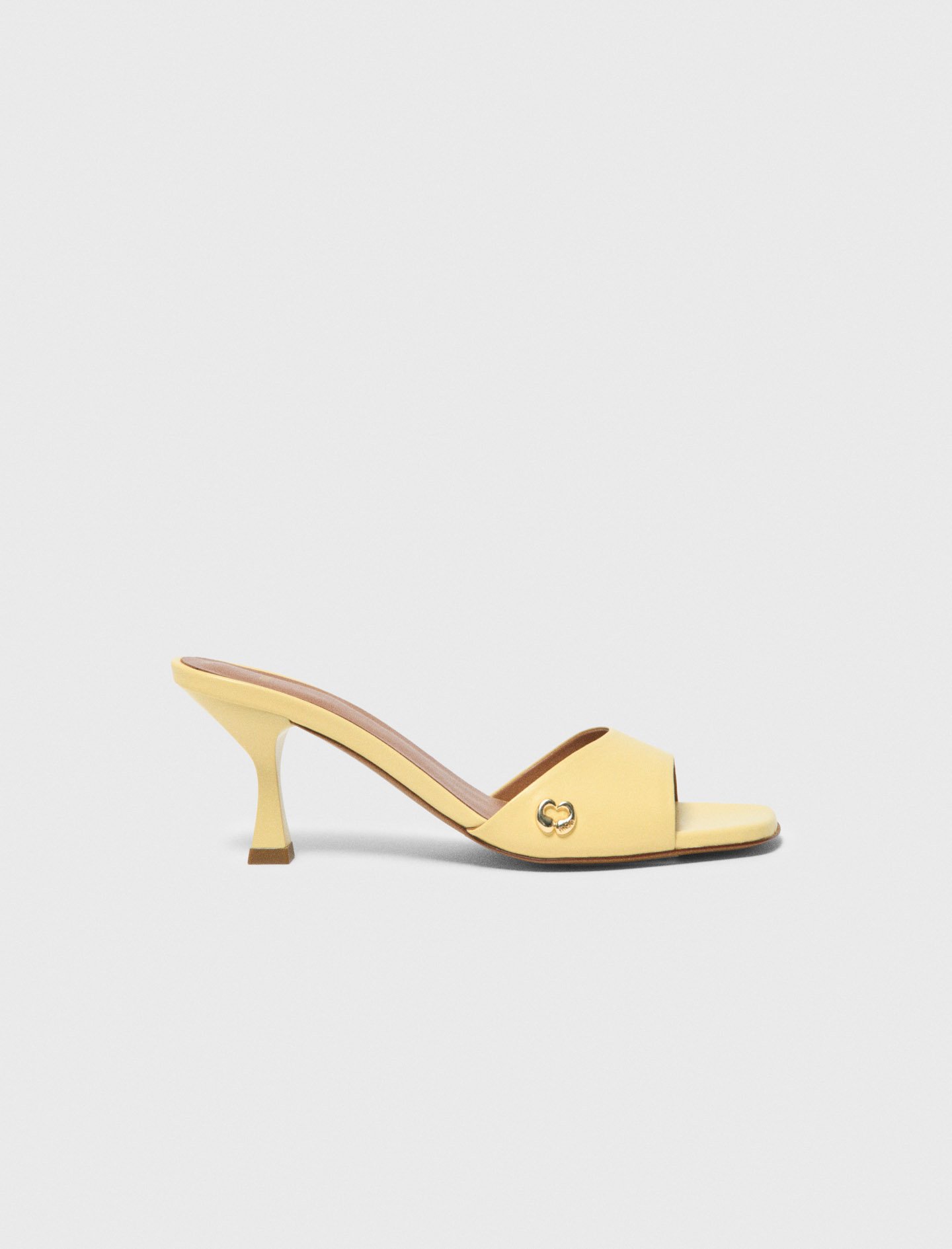Woman's leather Leather mules for Spring/Summer, size 10.5, in color Pale Yellow /